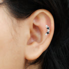 Rosec Jewels-1/4 CT Alternate Black Onyx and Moissanite Crawler Earring in Gold