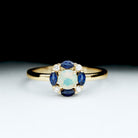 Rosec Jewels-Ethiopian Opal Engagement Ring with Blue Sapphire and Moissanite