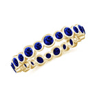 Rosec Jewels-Bezel Set Round Created Blue Sapphire Unique Full Eternity Ring