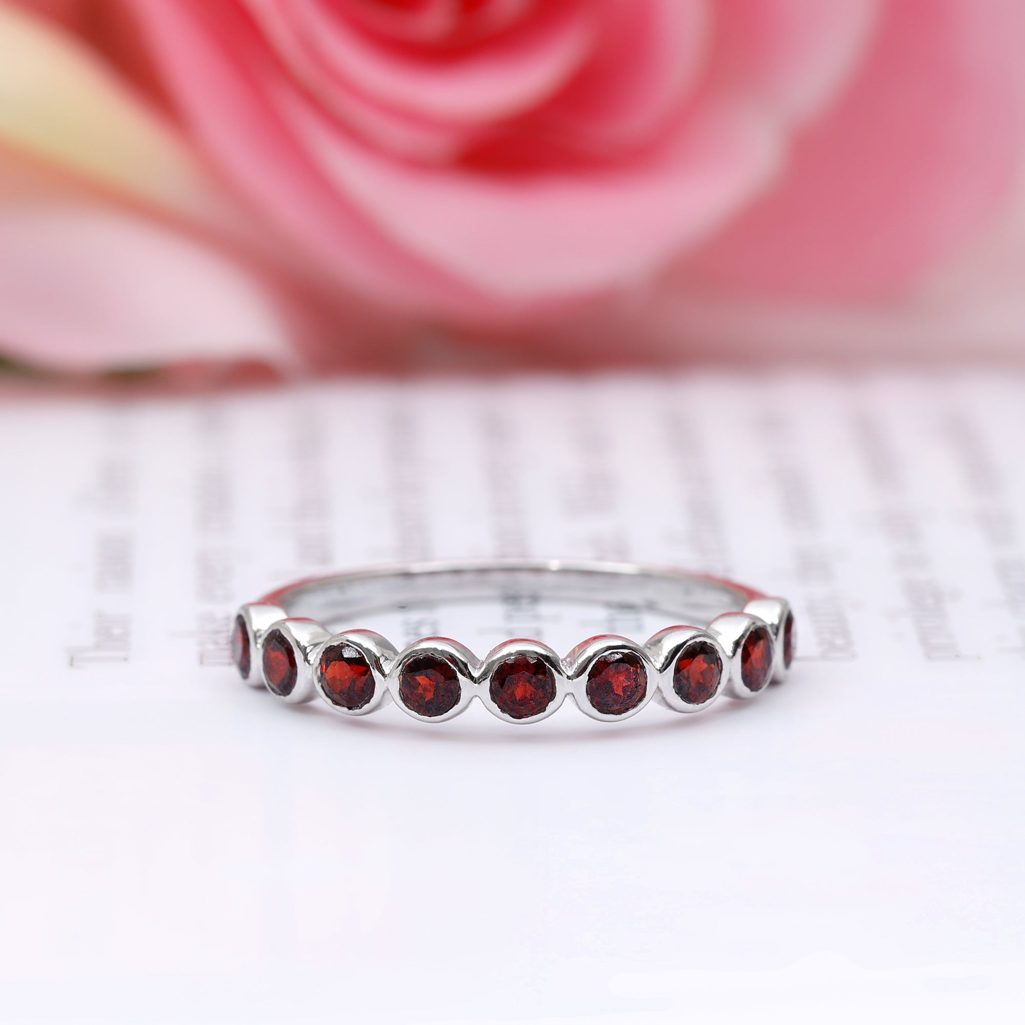 Rosec Jewels-1.25 CT Bezel Set Eternity Band with Garnet