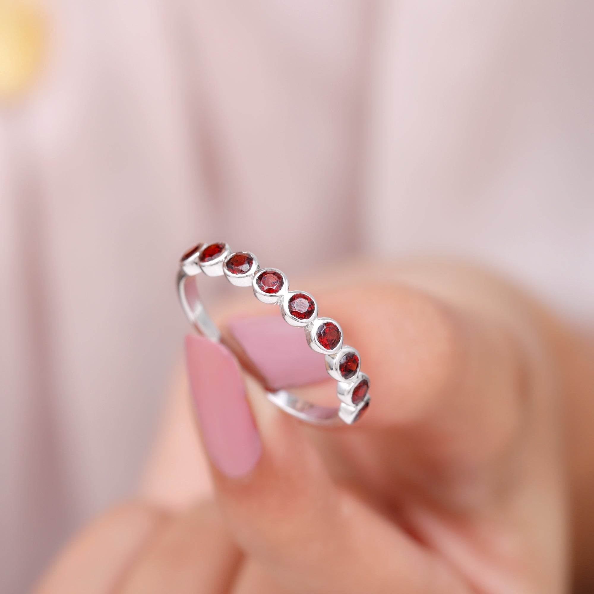 Rosec Jewels-1.25 CT Bezel Set Eternity Band with Garnet