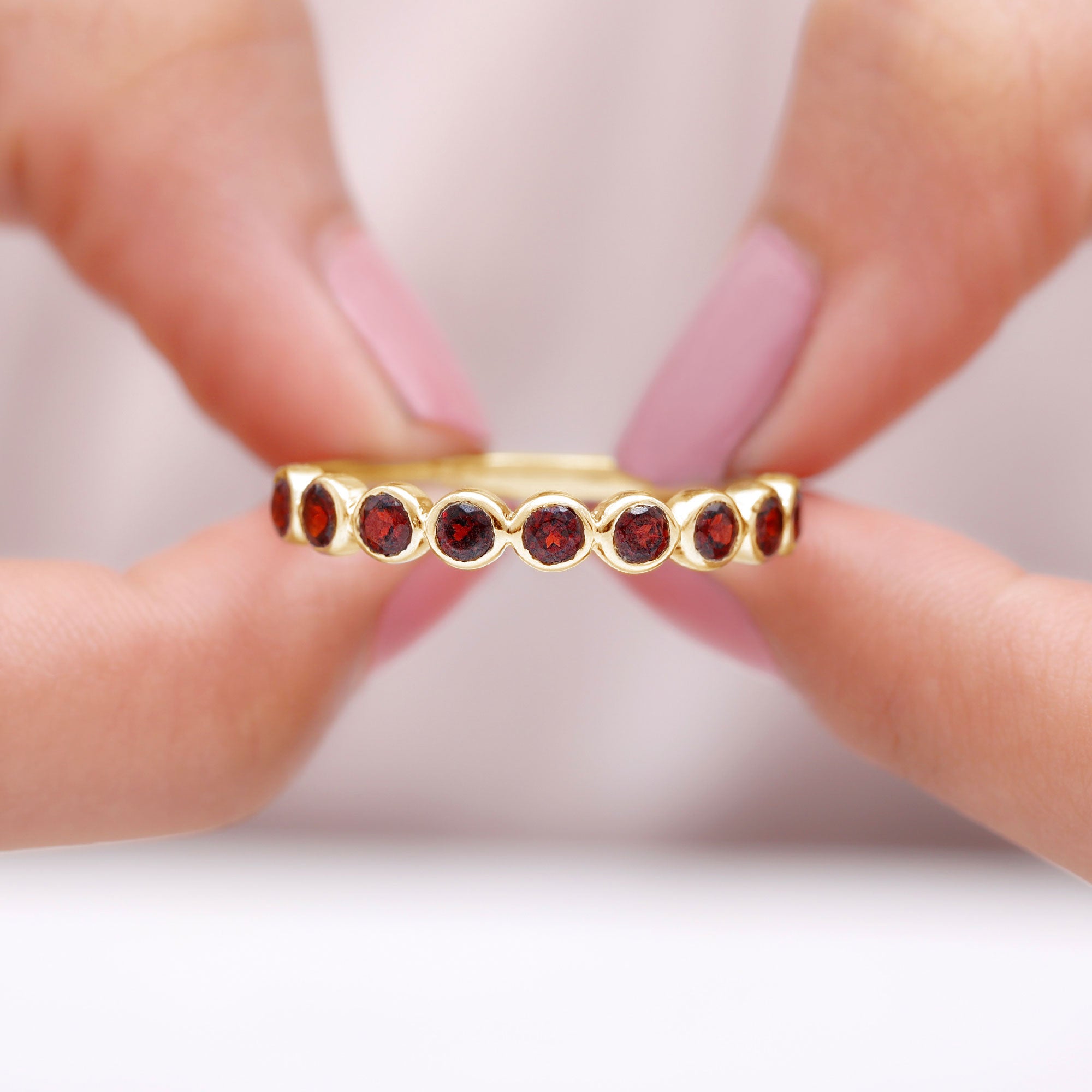 Rosec Jewels-1.25 CT Bezel Set Eternity Band with Garnet