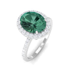 Rosec Jewels-Oval Cut Created Green Sapphire and Diamond Halo Ring