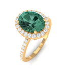 Rosec Jewels-Oval Cut Created Green Sapphire and Diamond Halo Ring