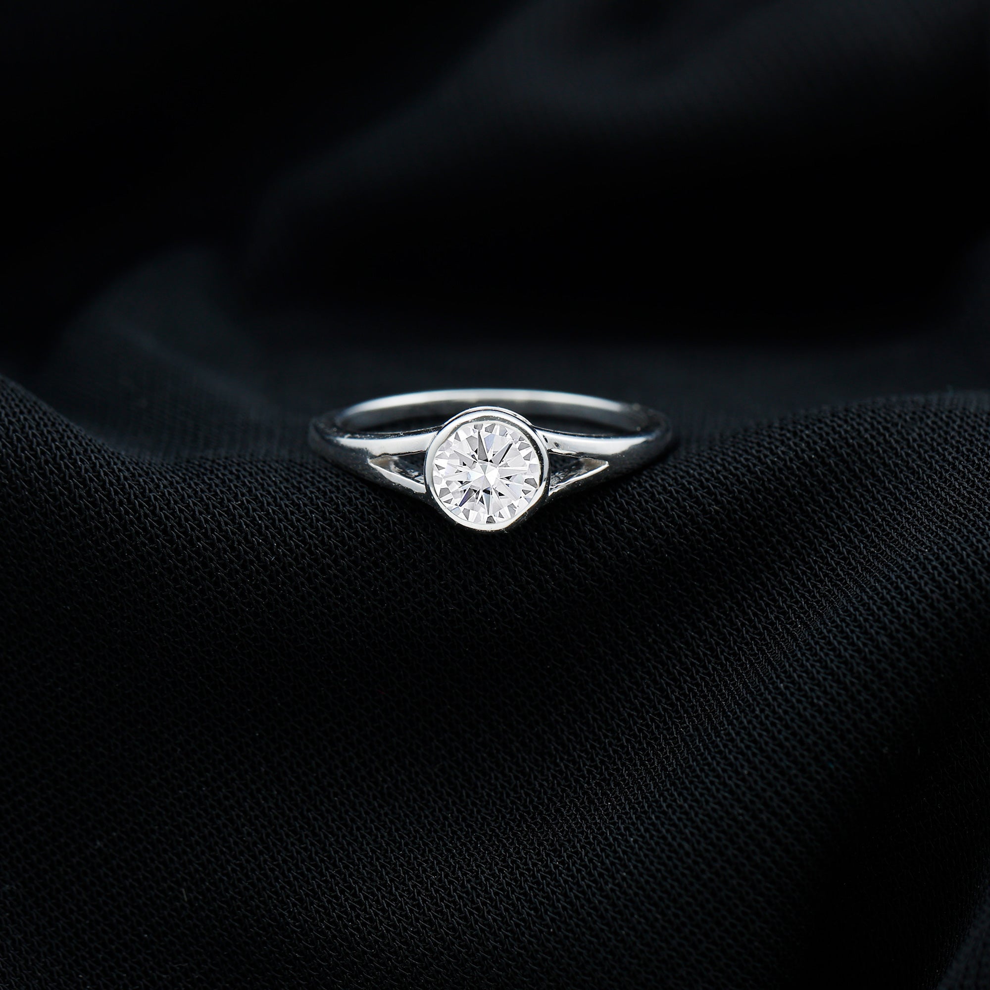 Rosec Jewels-Bezel Set Round Moissanite Solitaire Promise Ring in Split Shank