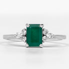 Rosec Jewels-Octagon Cut Emerald Engagement Ring with Diamond Trio