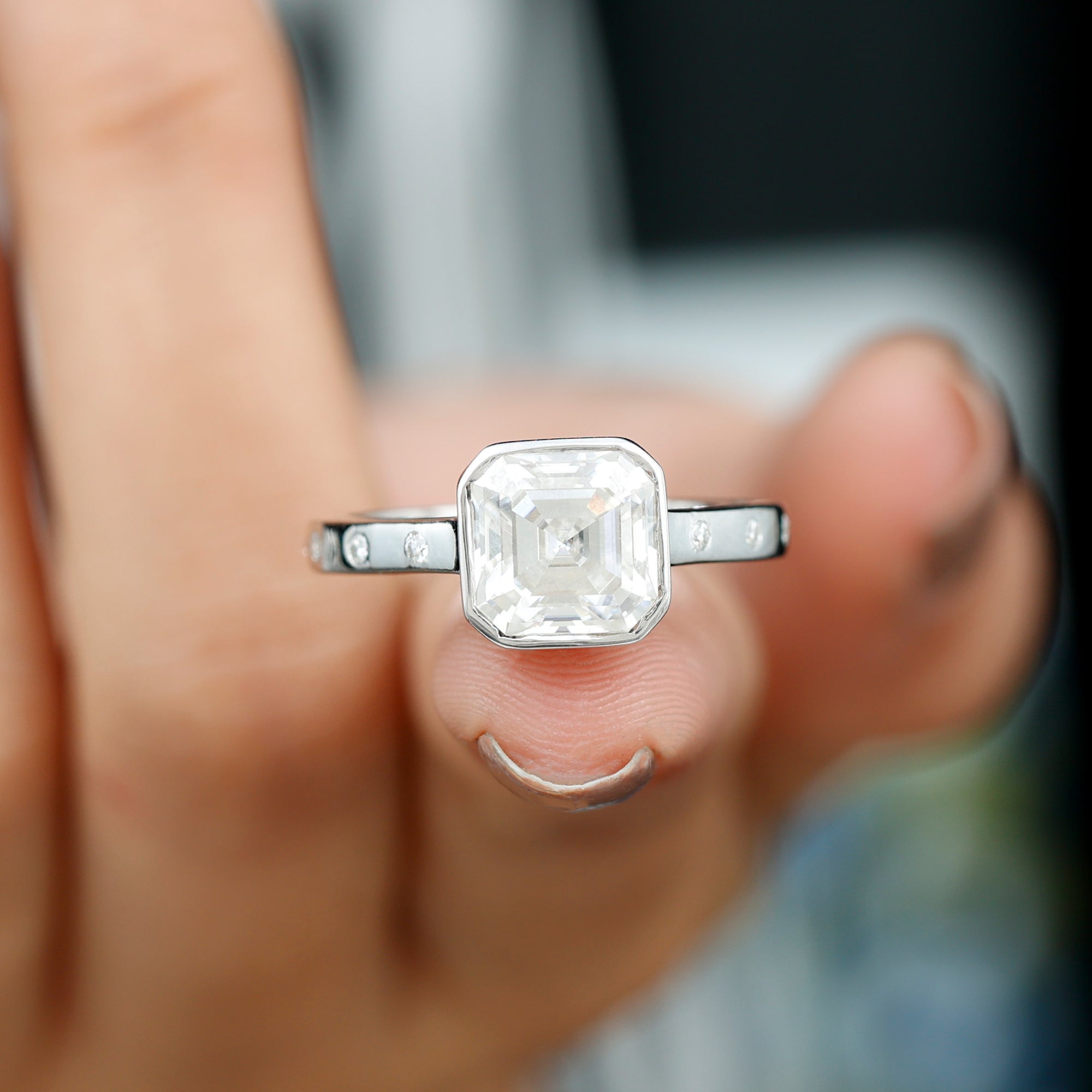 Rosec Jewels-7 MM Asscher Cut Moissanite Solitaire Ring in Bezel Setting with Sleek Accent