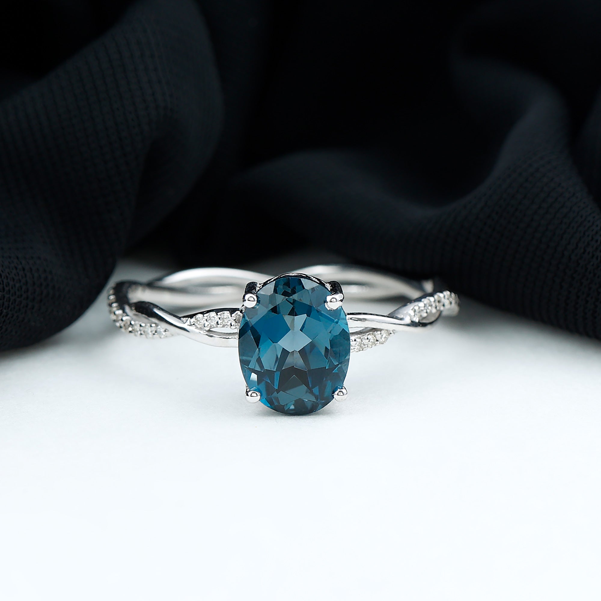 Rosec Jewels-Oval Cut Solitaire London Blue Topaz Braided Engagement Ring with Diamond