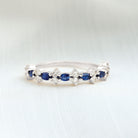 Rosec Jewels-Classic Blue Sapphire and Diamond Half Eternity Ring