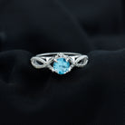 Rosec Jewels-Designer Swiss Blue Topaz and Diamond Crossover Engagement Ring