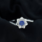 Rosec Jewels-Lab Grown Blue Sapphire and Diamond Flower Bypass Ring