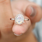 Rosec Jewels-1.50 CT Oval Shape Ethiopian Opal Engagement Ring with Diamond Halo