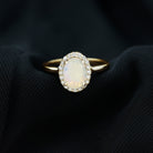 Rosec Jewels-1.50 CT Oval Shape Ethiopian Opal Engagement Ring with Diamond Halo