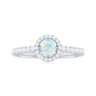 Rosec Jewels-0.75 CT Ethiopian Opal and Diamond Halo Engagement Ring