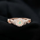 Rosec Jewels-3/4 CT Ethiopian Opal and Diamond Crossover Engagement Ring