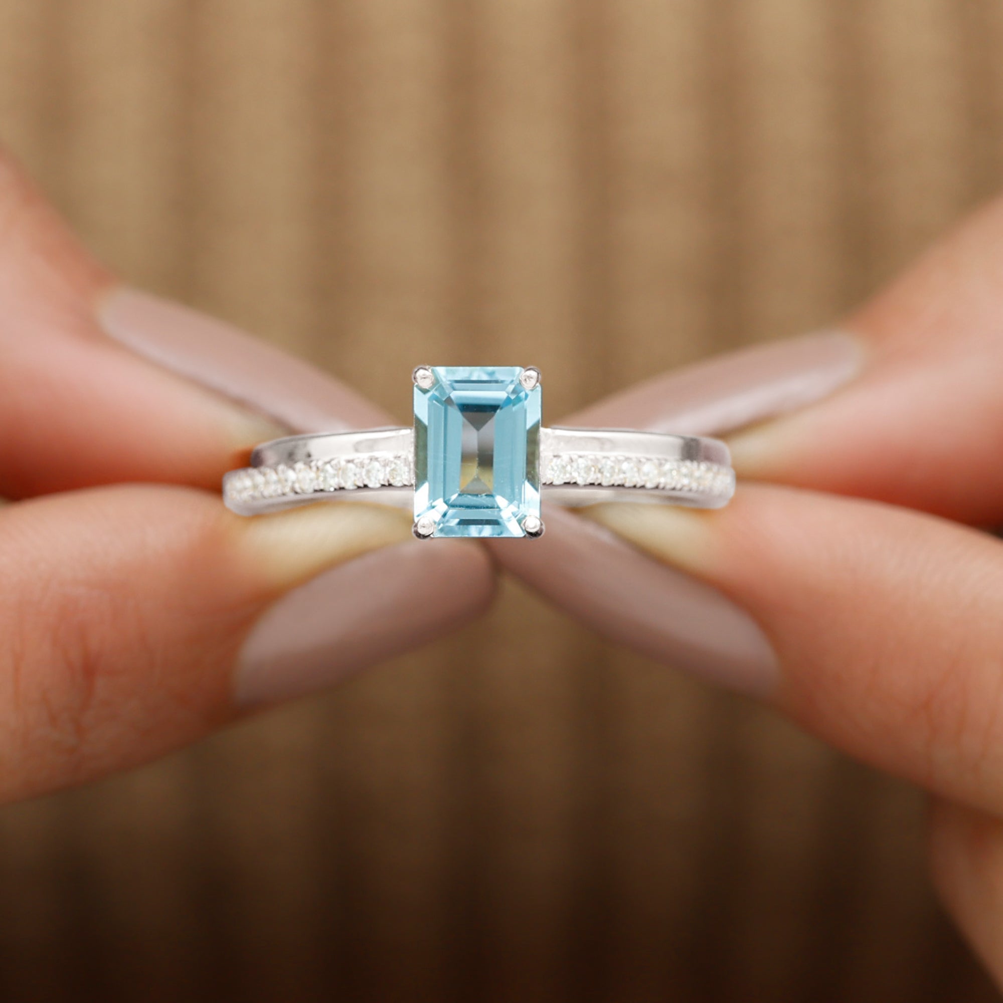 Rosec Jewels-Solitaire Engagement Ring with Emerald Cut Sky Blue Topaz and Diamond