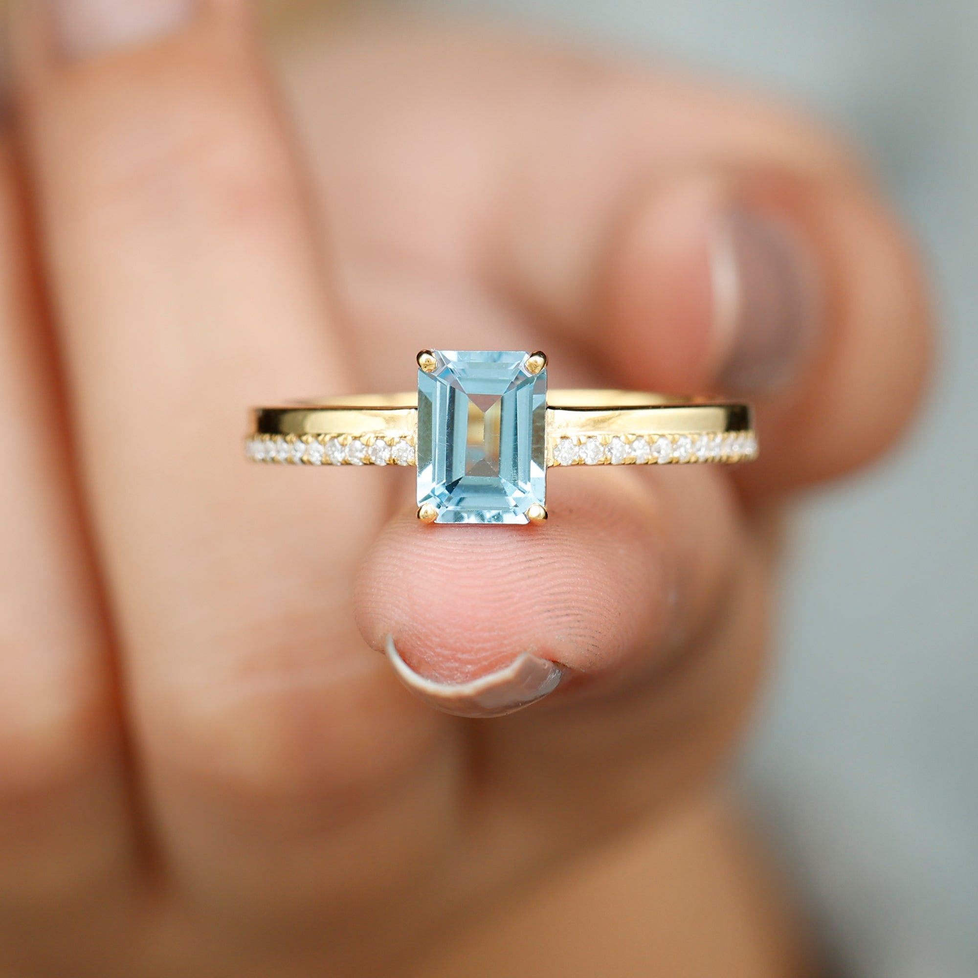 Rosec Jewels-Solitaire Engagement Ring with Emerald Cut Sky Blue Topaz and Diamond