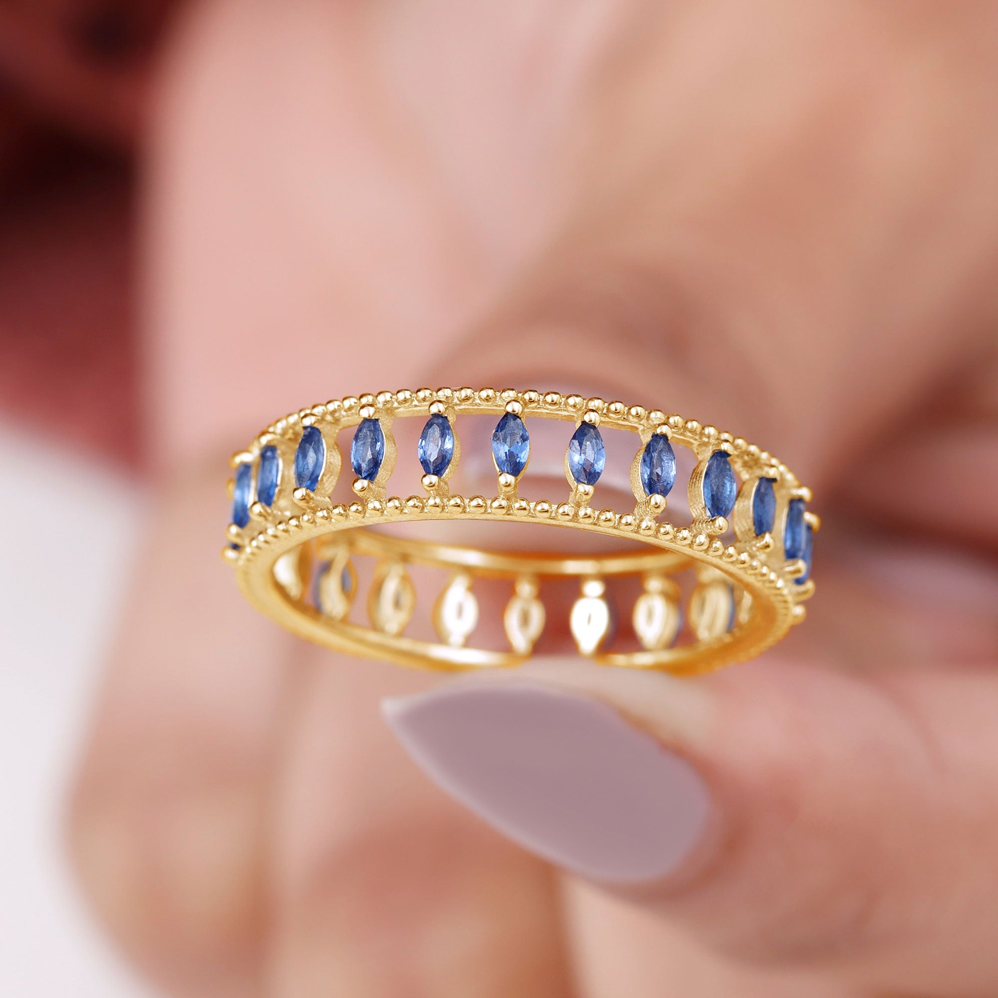 Rosec Jewels-Marquise Cut Created Blue Sapphire Eternity Band with Beaded Detailing