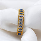 Rosec Jewels-Marquise Cut Created Blue Sapphire Eternity Band with Beaded Detailing