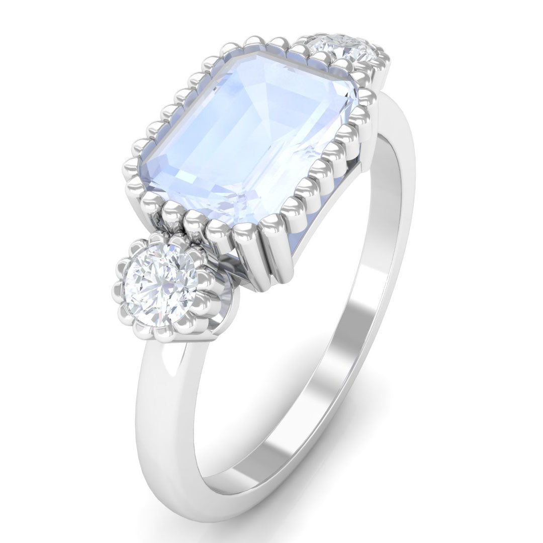 Rosec Jewels-Moonstone East West Engagement Ring with Diamond in Beaded Bezel Setting