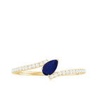 Rosec Jewels-Tilted Pear Cut Blue Sapphire Solitaire Bypass Ring with Diamond