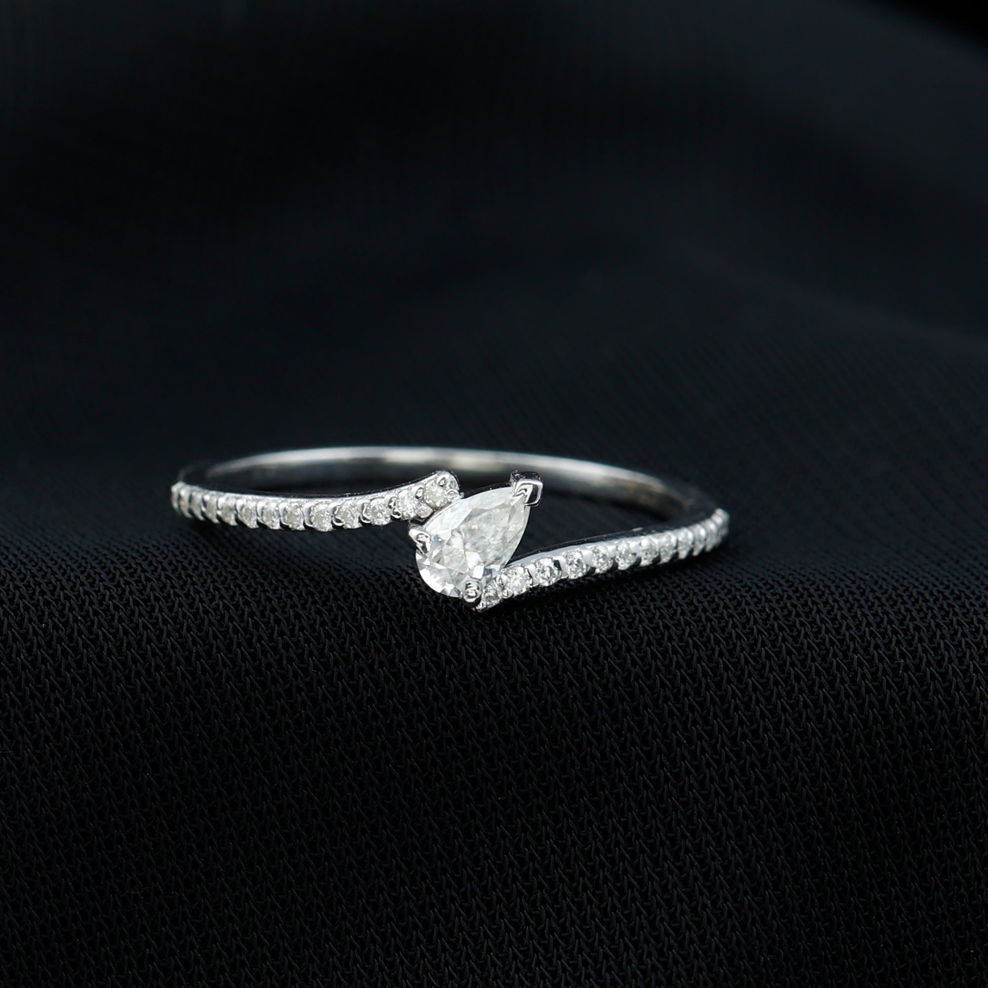 Rosec Jewels-Simple Bypass Promise Ring with Tilted Pear Shape Moissanite