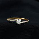 Rosec Jewels-Simple Bypass Promise Ring with Tilted Pear Shape Moissanite