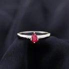 Rosec Jewels-Simple Pear Cut Ruby Solitaire Promise Ring