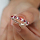 Rosec Jewels-Baguette Cut Ruby Half Eternity Ring with Diamond Accent