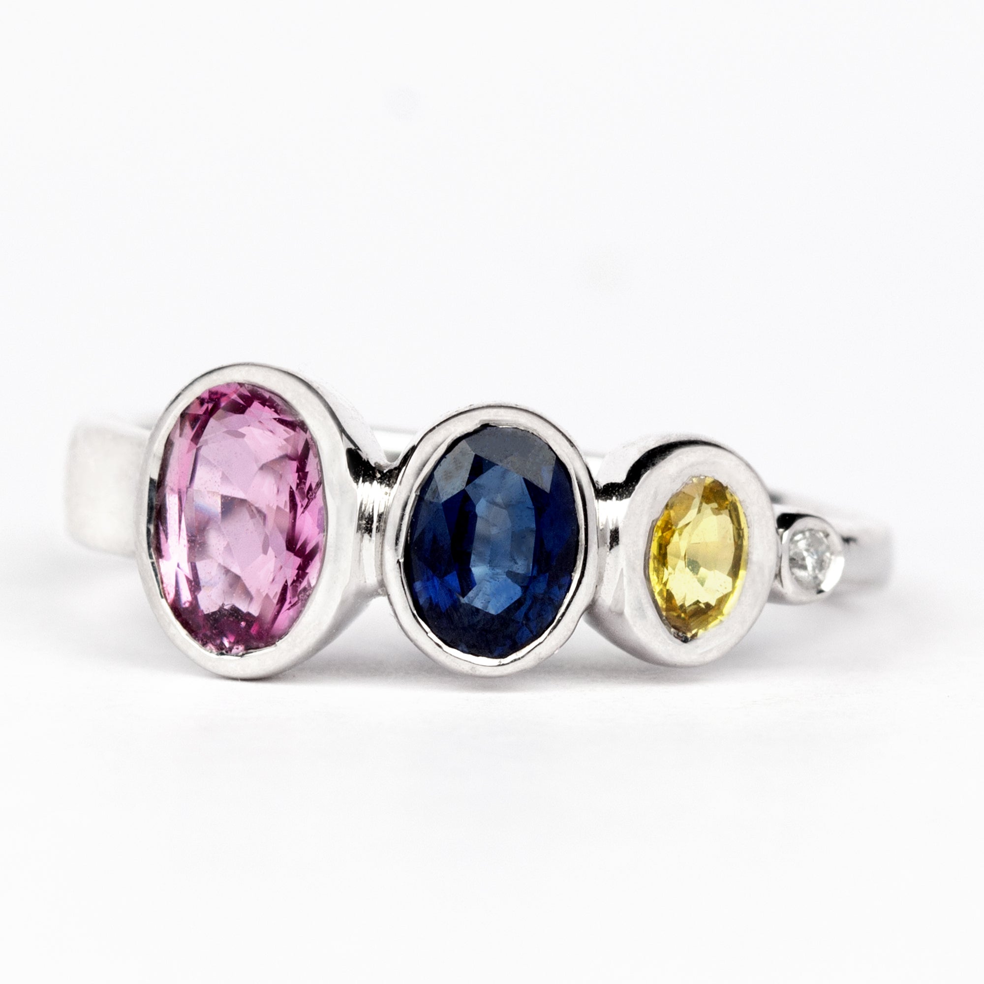 Rosec Jewels-Graduated Style Oval Cut Multi Created Sapphire Ring with Moissanite