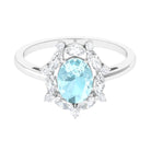 Rosec Jewels-Oval Sky Blue Topaz Designer Halo Engagement Ring with Moissanite