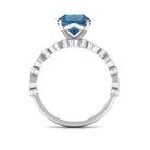 Rosec Jewels-2.50 CT Solitaire London Blue Topaz and Diamond Accent Engagement Ring with Milgrain Details