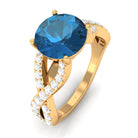 Rosec Jewels-4 Prong Set Solitaire London Blue Topaz Crossover Ring with Diamond Accent