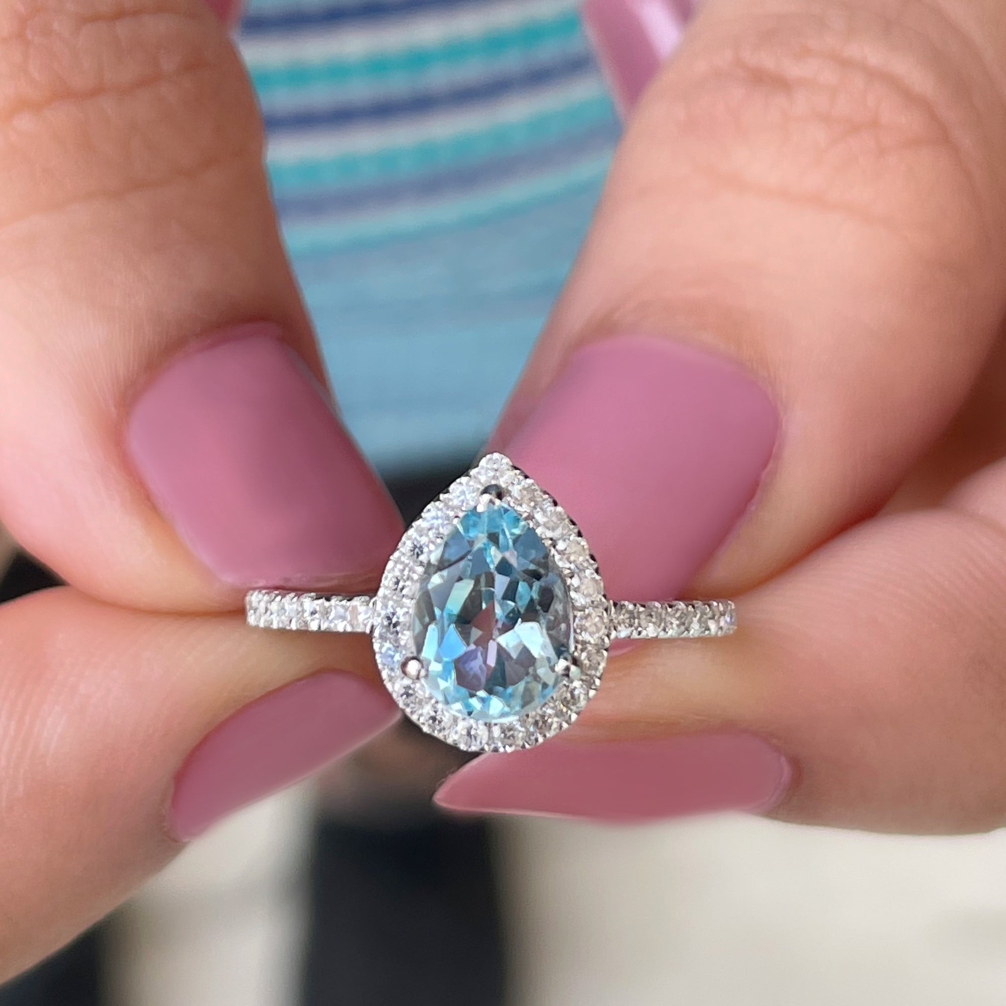 Rosec Jewels-1.5 CT Sky Blue Topaz Teardrop Engagement Ring with Diamond Halo