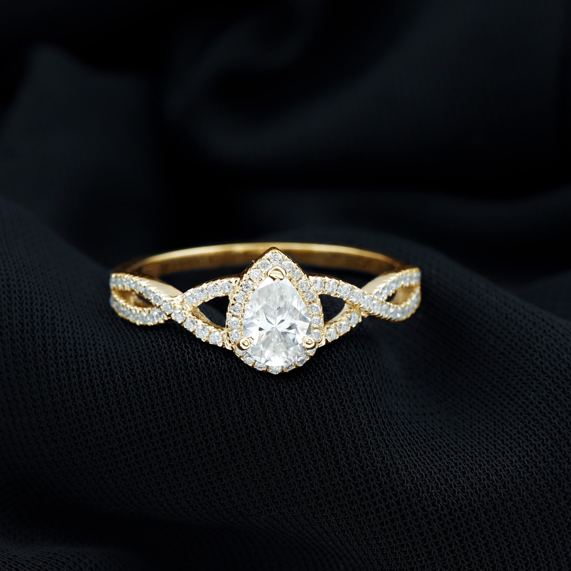 Rosec Jewels-Pear Shaped Moissanite Crossover Engagement Ring in Gold