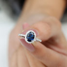 Rosec Jewels-2 CT Oval Cut Lab Created Blue Sapphire Ring with Diamond Halo and Side Stones