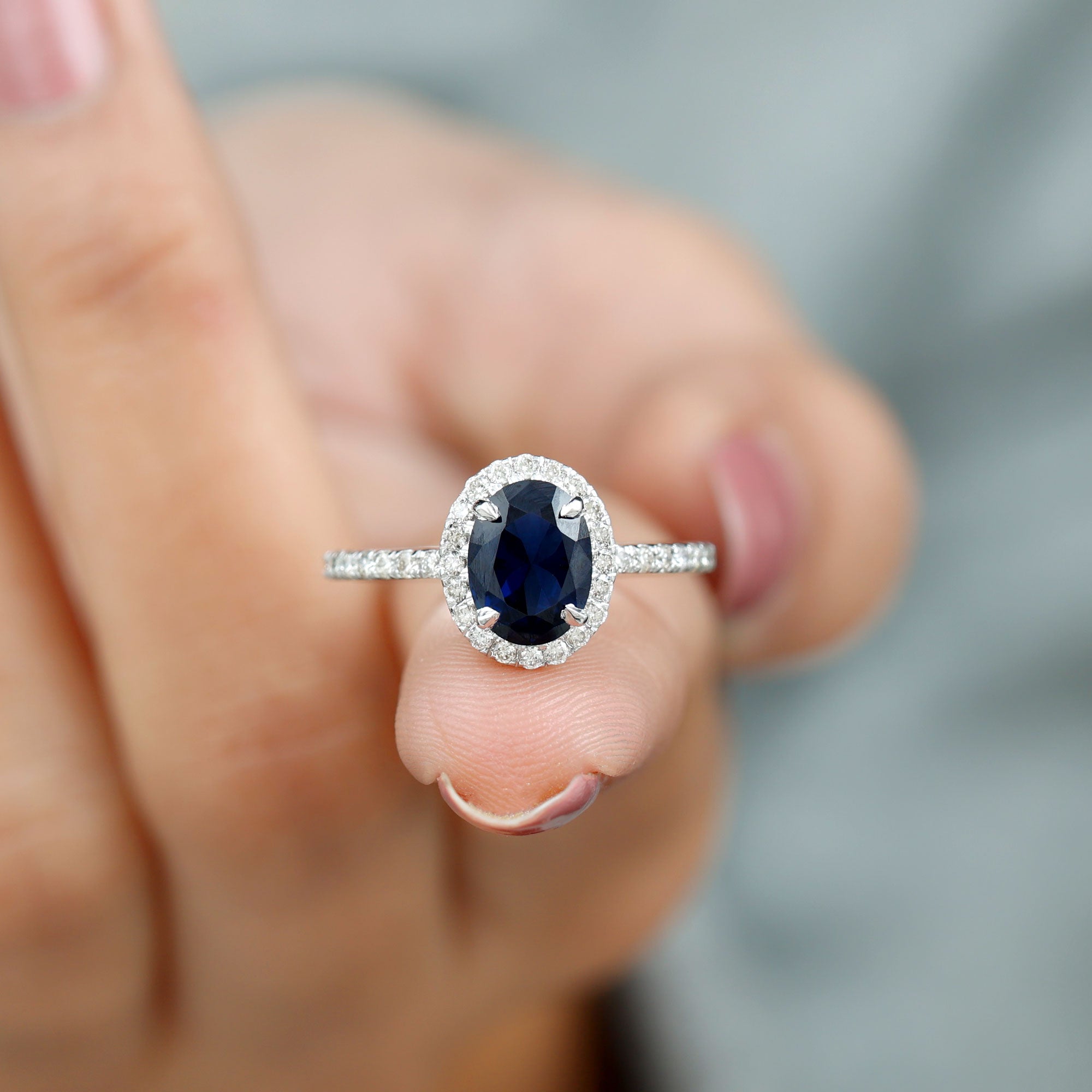 Rosec Jewels-2 CT Oval Cut Lab Created Blue Sapphire Ring with Diamond Halo and Side Stones