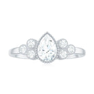 Rosec Jewels-Pear and Round Cut Moissanite Designer Ring in Gold